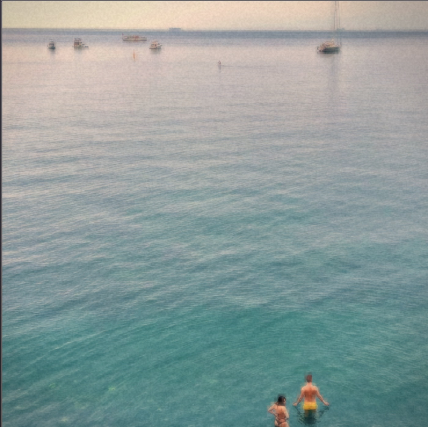 The sea, warm and faded